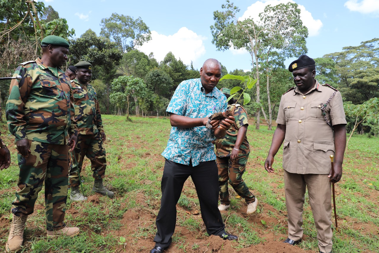 L: Hezron Nyamberi, Senior Deputy Secretary Ministry of Information, Communications and The Digital Economy, Nandi South Deputy County Commissioner Mokin Ptang'uny, Nandi County Forest Conservator Dennis Kerengo and Nandi County Warden Augustine Langat during tree planting exercise in Kubojoi Forest, Nandi South Sub-County.