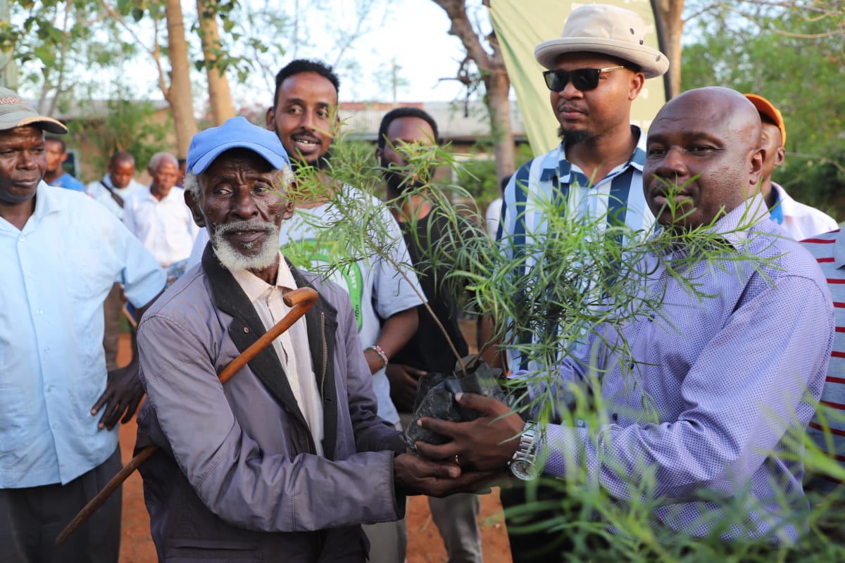 Labour and Skills Principal Secretary, Shadrack Mwadime with Taita Taveta residents.