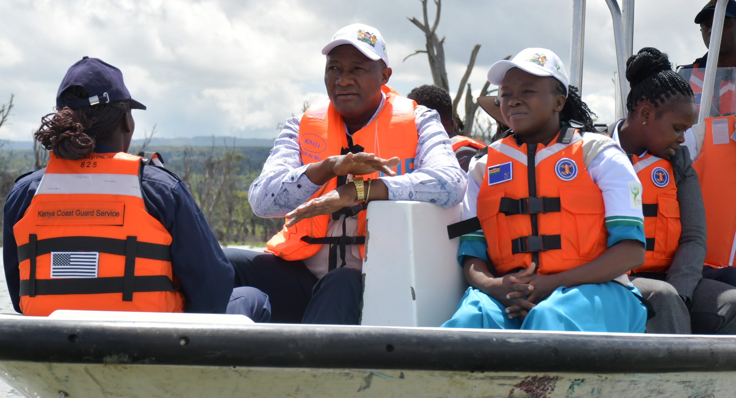 Environment, Climate Change and Forestry CS Dr. Deborah Mlongo Barasa and Nyandarua County Governor Moses Kiarie Badilisha (in white caps, both facing camera) 