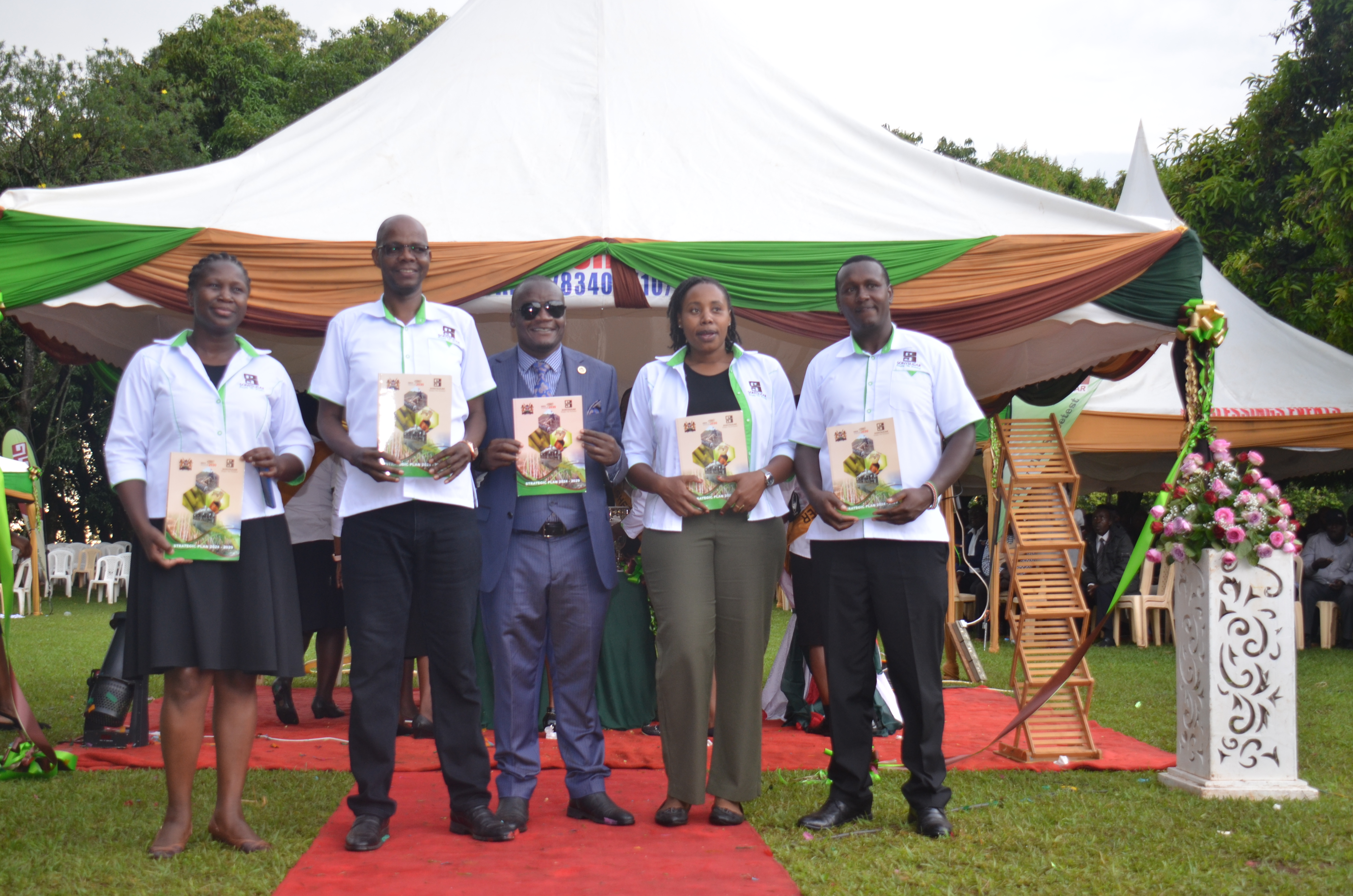Sony-Sugar Managing Director Martine Dima (2nd L) dur ing the launch of the South Nyanza Sugar Company Ltd  (Sony-Sugar) strategic plan for 2024-2029. He outlined  the key targets of the five-year plan.