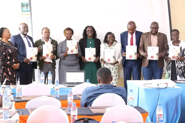 Lead coordinators of Trans Nzoia County Development projects display copies of guidelines to help in formation of Project Management Committees (PCMs).
