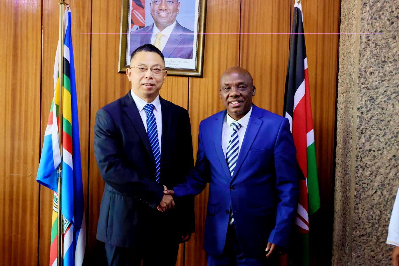 Principal Secretary, State Department for Agriculture, Kipronoh Ronoh (Right) and Qi Jun of China, during the high-level bilateral engagement in Kilimo House, Nairobi, where he hosted the Chinese Delegation.