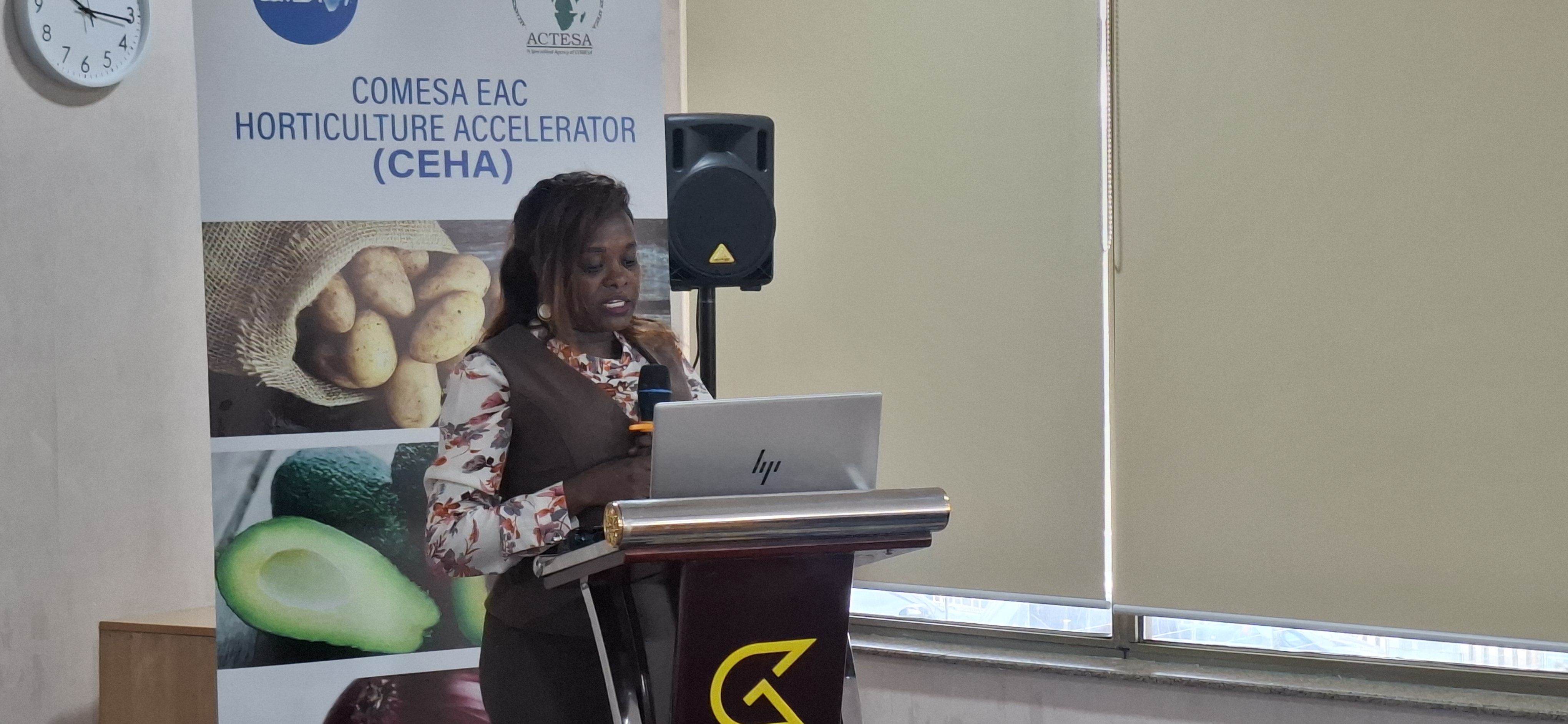 Ms. Caroline Chore- a Senior Trade Development Officer reading a speech on behalf of the State Department for Trade Principal Secretary (PS) Ms. Regina Ombam during the COMESA-EAC Horticulture Accelerator (CEHA) Regional Workshop.