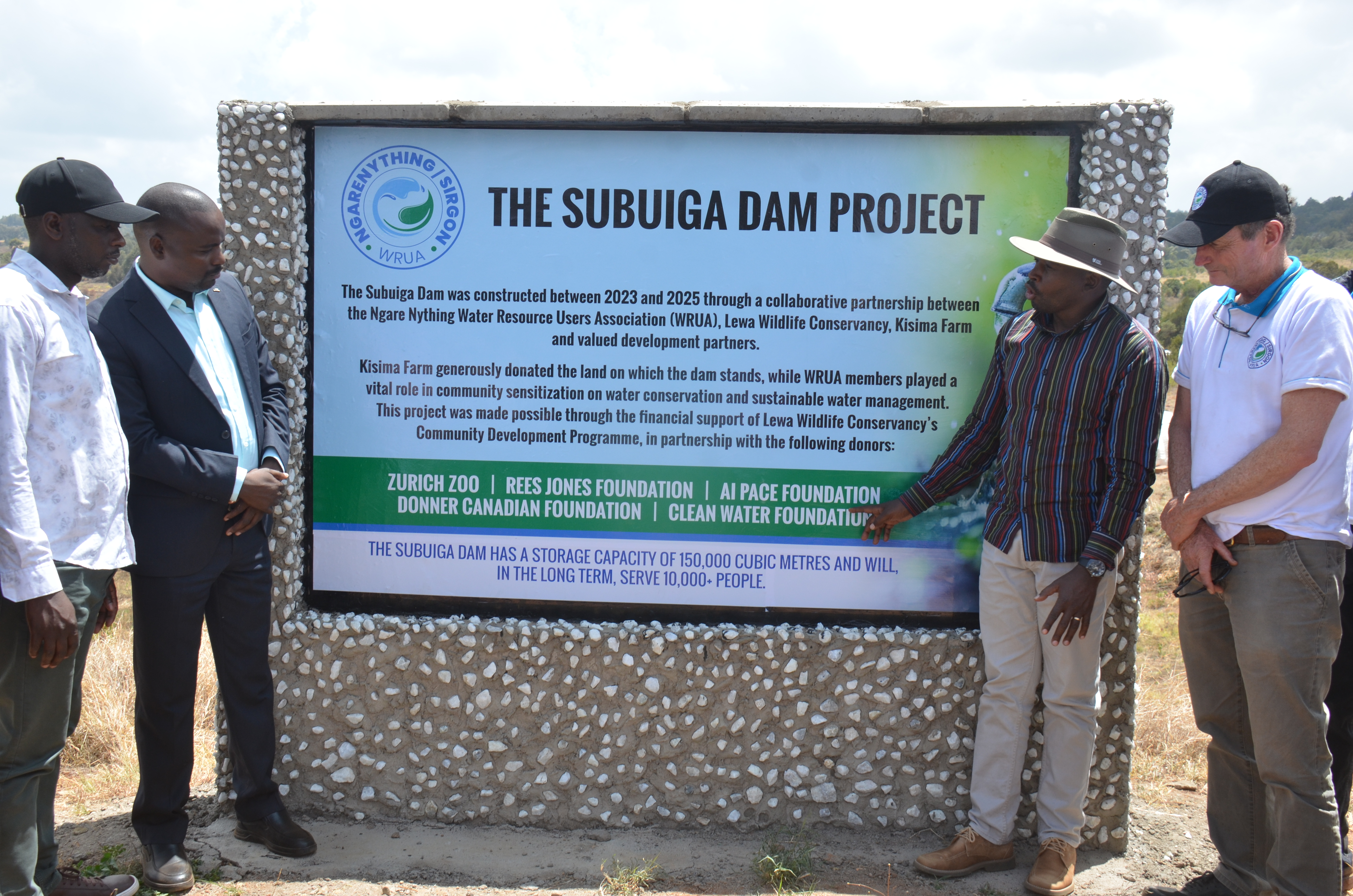 From left: Kisima MCA Patrick Mutuma, Water, Natural Resources and Climate Change Chief Officer Patrick Mutuma, Lewa Conservancy Partnerships and Programs Coordinator John Kinoti and Ngarenythig WRUA Chairman Martin Dyer during the launch of the dam.