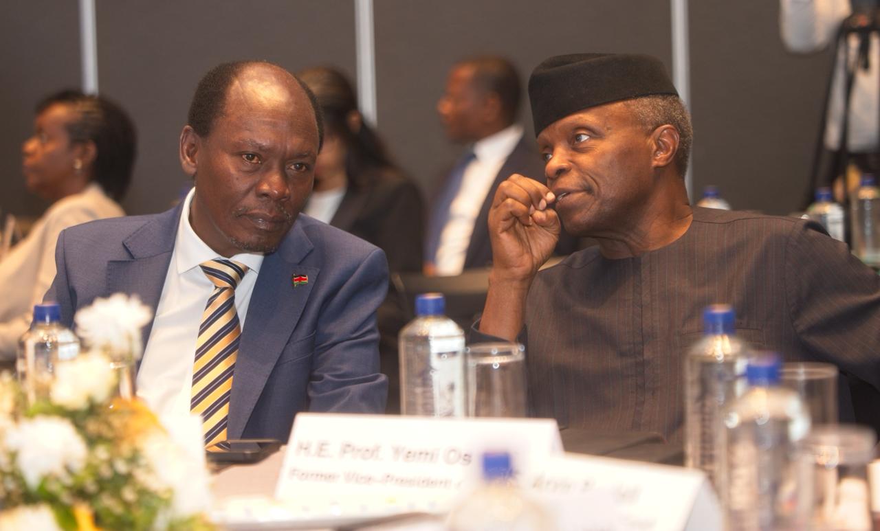 The Cabinet Secretary, Ministry of Information, Communications and the Digital Economy, William Kabogo Gitau, having tête-à-tête with the Former Vice-President of Nigeria, Prof. Yemi Osinbajo during the Public-private dialogue on mobilising the private sector for sustainable trade and investment in the agrifood sector in Africa, held in Nairobi. PHOTO: ALFRED MWANIKI