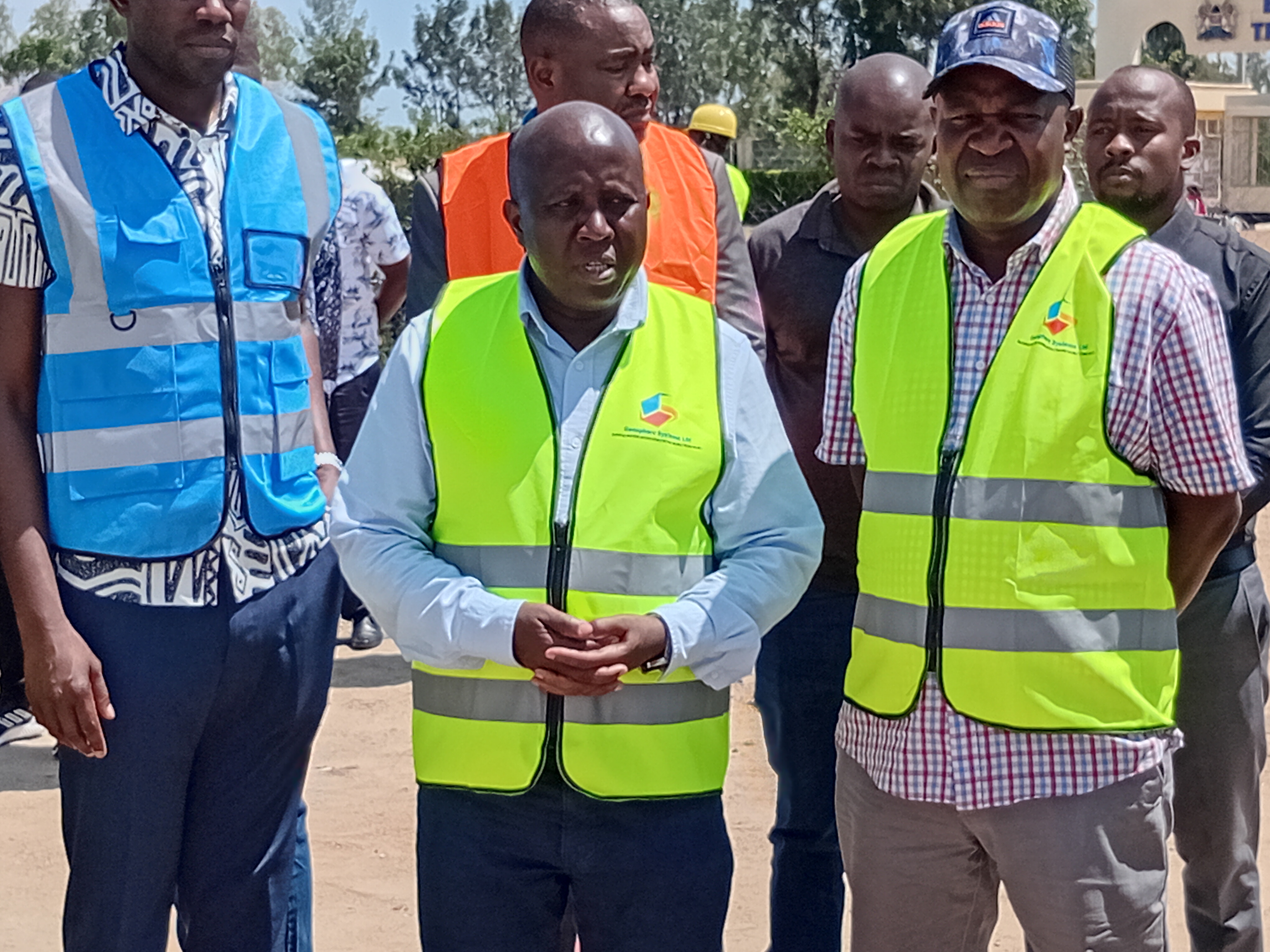 ICT Principal Secretary Eng. John Tanui (centre) during inspection of ongoing construction of digital hubs in Bondo and Rarieda Sub-Counties. He was accompanied by Health PS Dr Ouma Oluga (Left) and Kisumu Deputy Governor Mathews Owili(right).