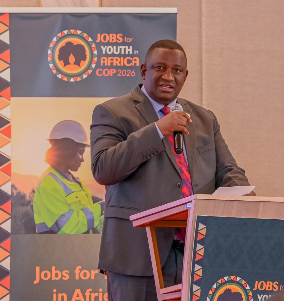 Cabinet Secretary for Youth Affairs, Creative Economy and Sports,  Salim Mvurya, addresses delegates during the Jobs for Youth in Africa (JfYA) Community of Practice Knowledge Exchange Summit in Nairobi.