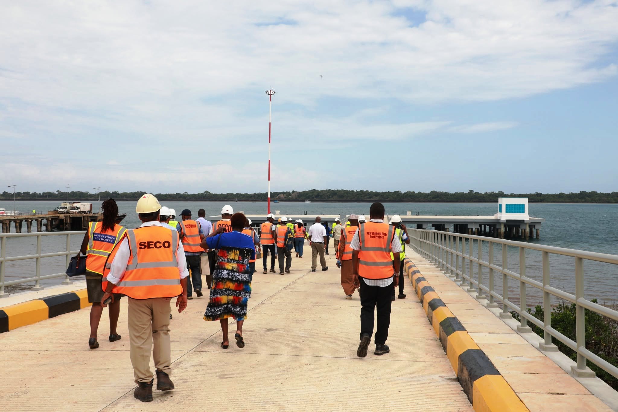 KPA senior officials on a tour of the Sh2.6 billion Shimoni fish port project site in Kwale County which has been completed.