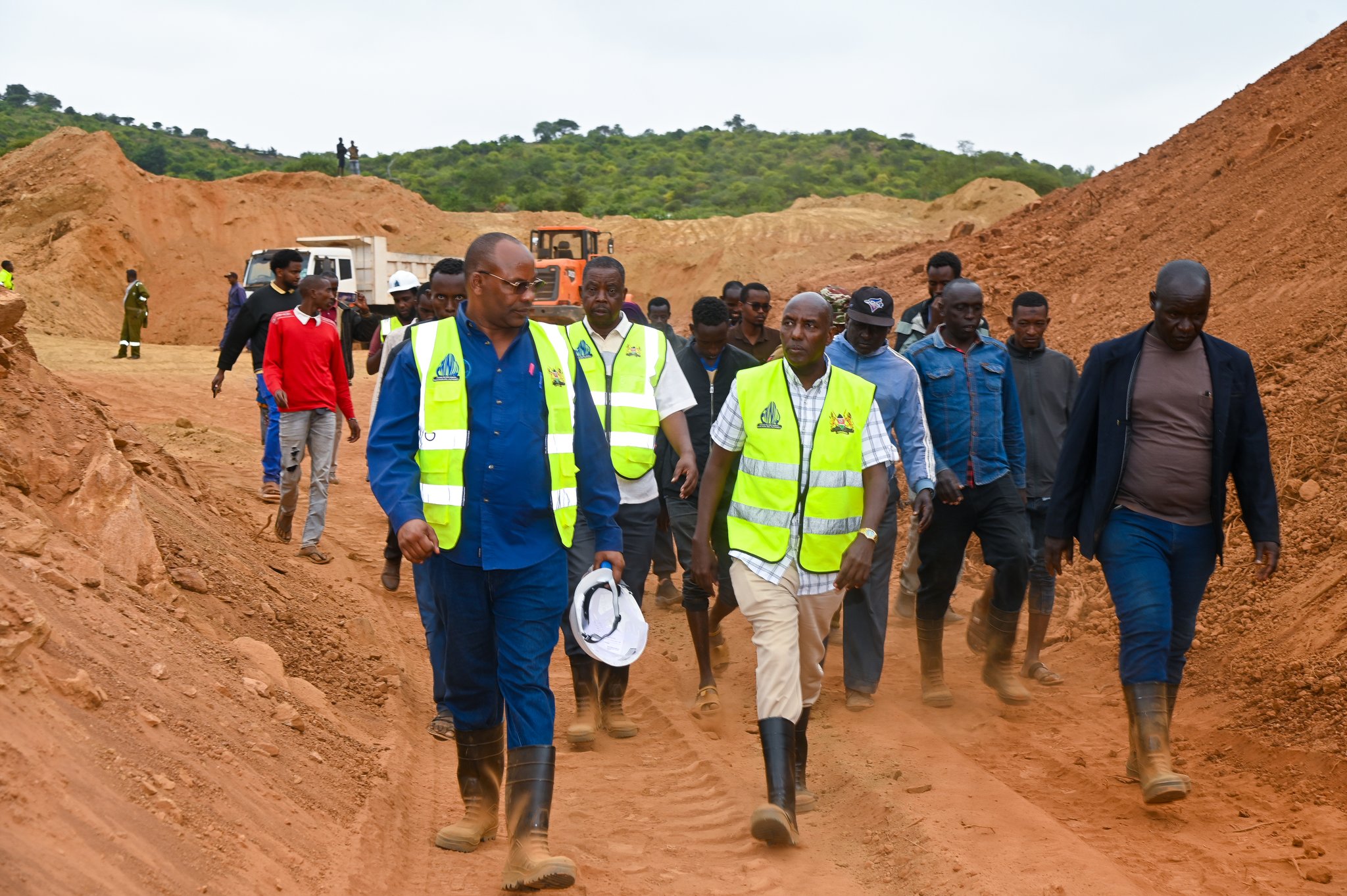 State Department for ASALs and Regional Development Kello Harsama (centre) inspects the ongoing construction of Somare Dam in Moyale, Marsabit County.