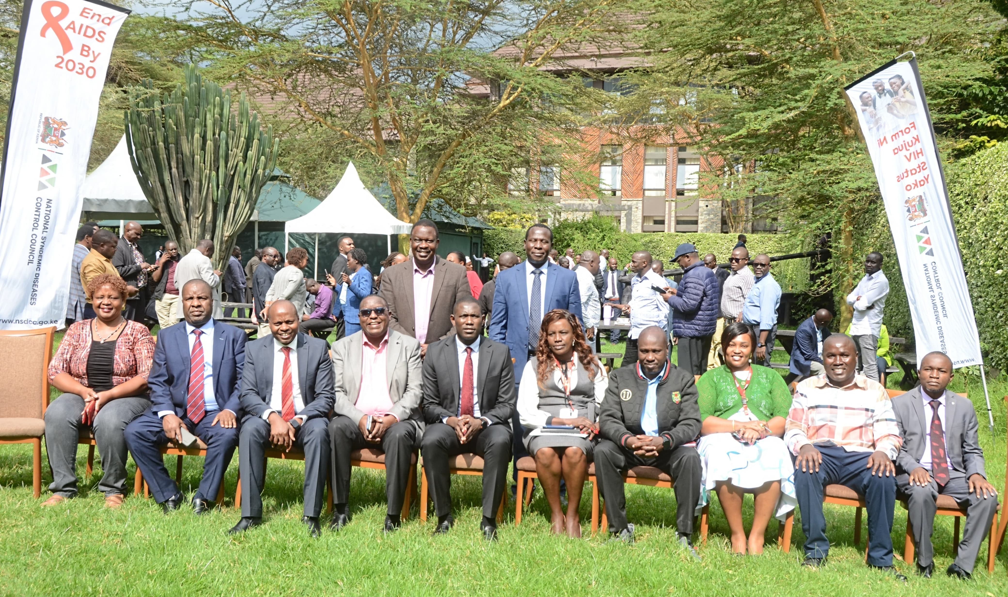 Group photo of Dr. Ouma Oluga with participants at the Joint Annual Program Review Workshop hosted by the National Syndemic Diseases Control Council (NSDCC) in Naivasha.
