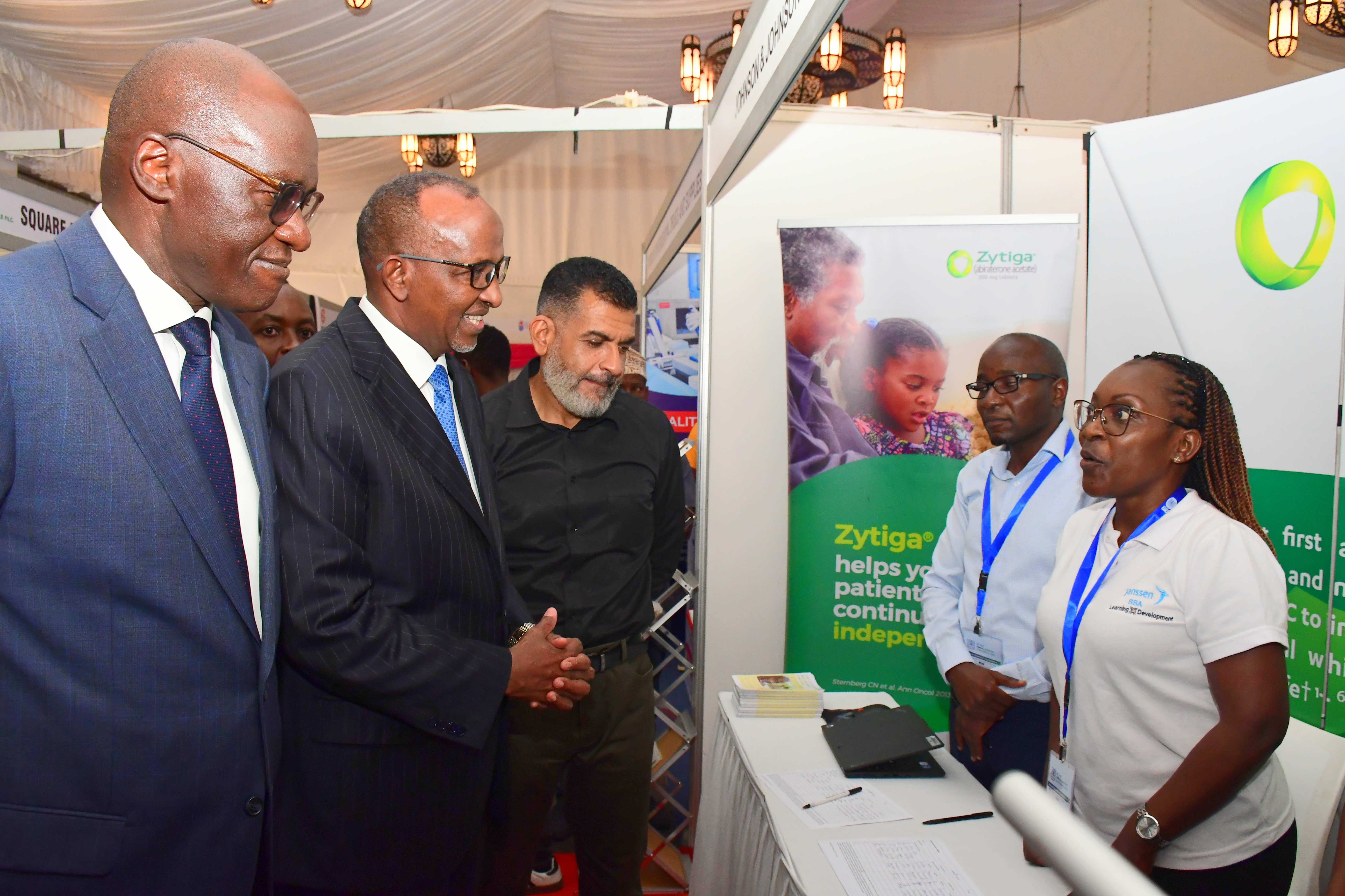 Health CS Aden Duale (Second L) flanked by Director of Health Dr. Patrick Amoth (L) and Mombasa Governor Abdulswamad Nassir visits pavilions on the sidelines of the 45th Pharmaceutical Society of Kenya (PSK) conference at a Mombasa hotel. 
