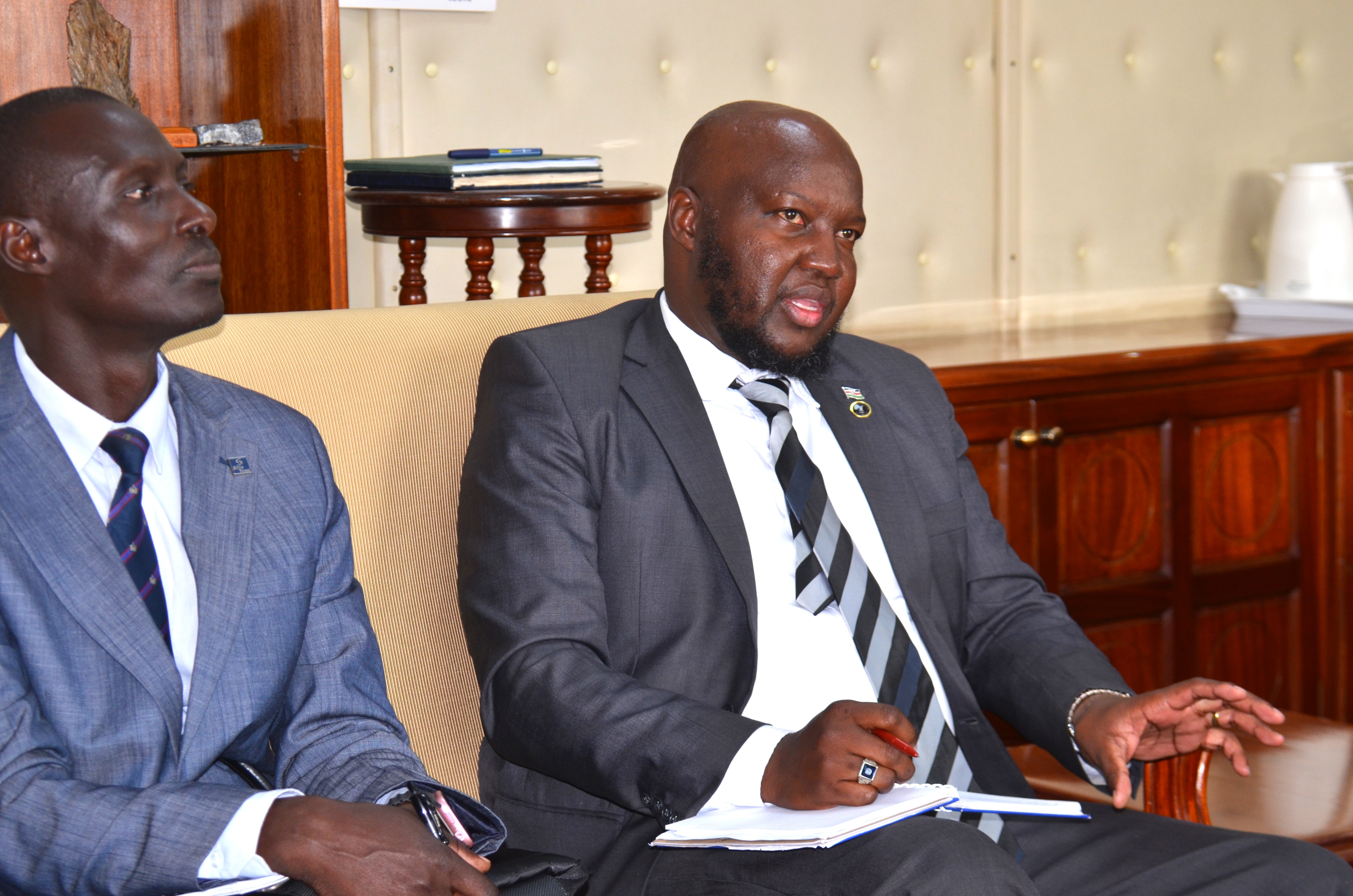 Mr. Masisi Kiilu (R), one of the NCTC officials, making a contribution during the meeting.