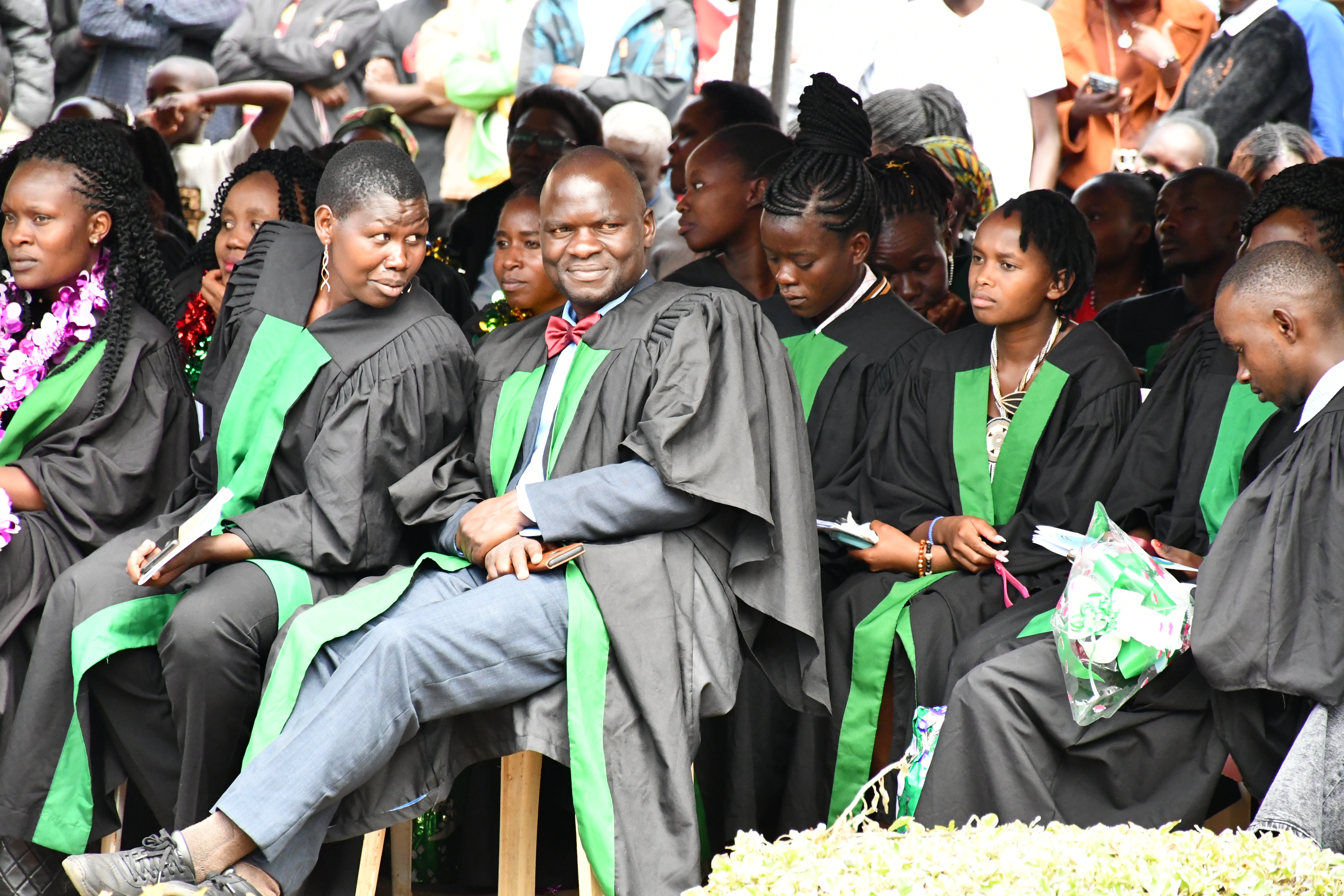 Graduands of Moi Teachers Training College follow proceedings during the institution’s 29th graduation ceremony at the school’s grounds in Seretunin, Baringo Central.