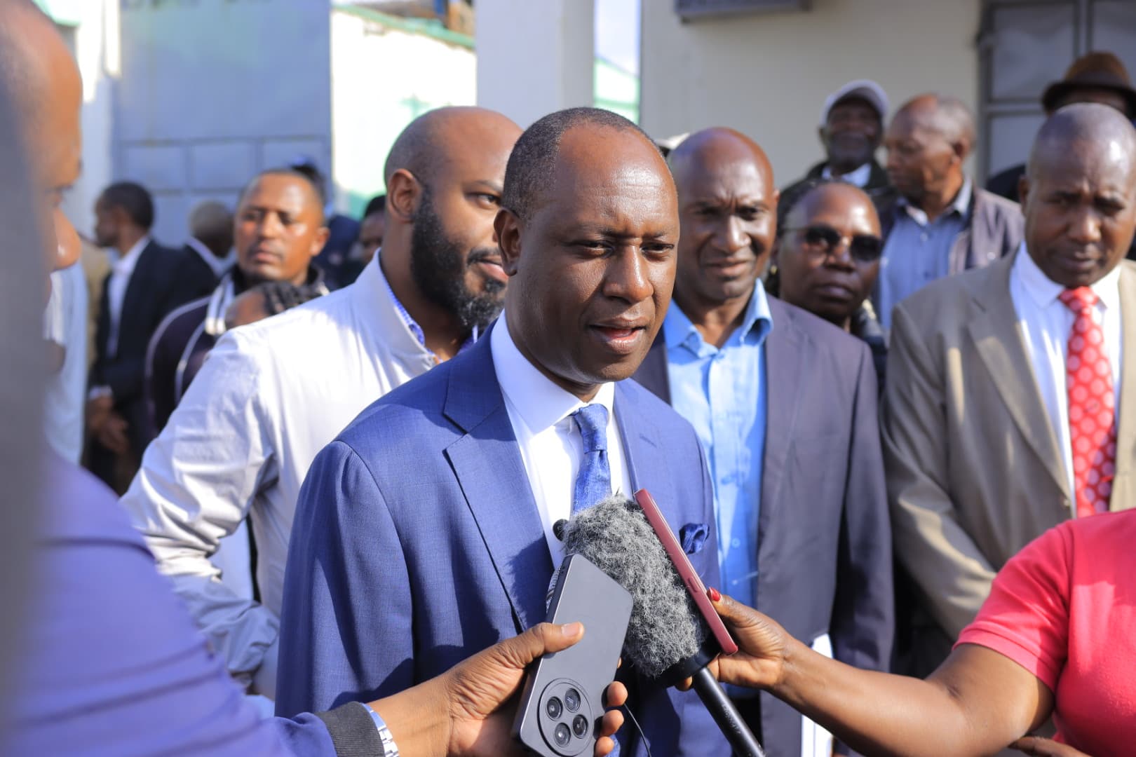Livestock Development Principal Secretary, Jonathan Mueke, at Ndarugu Dairy Cooperative Society in Gatundu South Sub-county during the delivery of a 5,000 litres milk cooler 