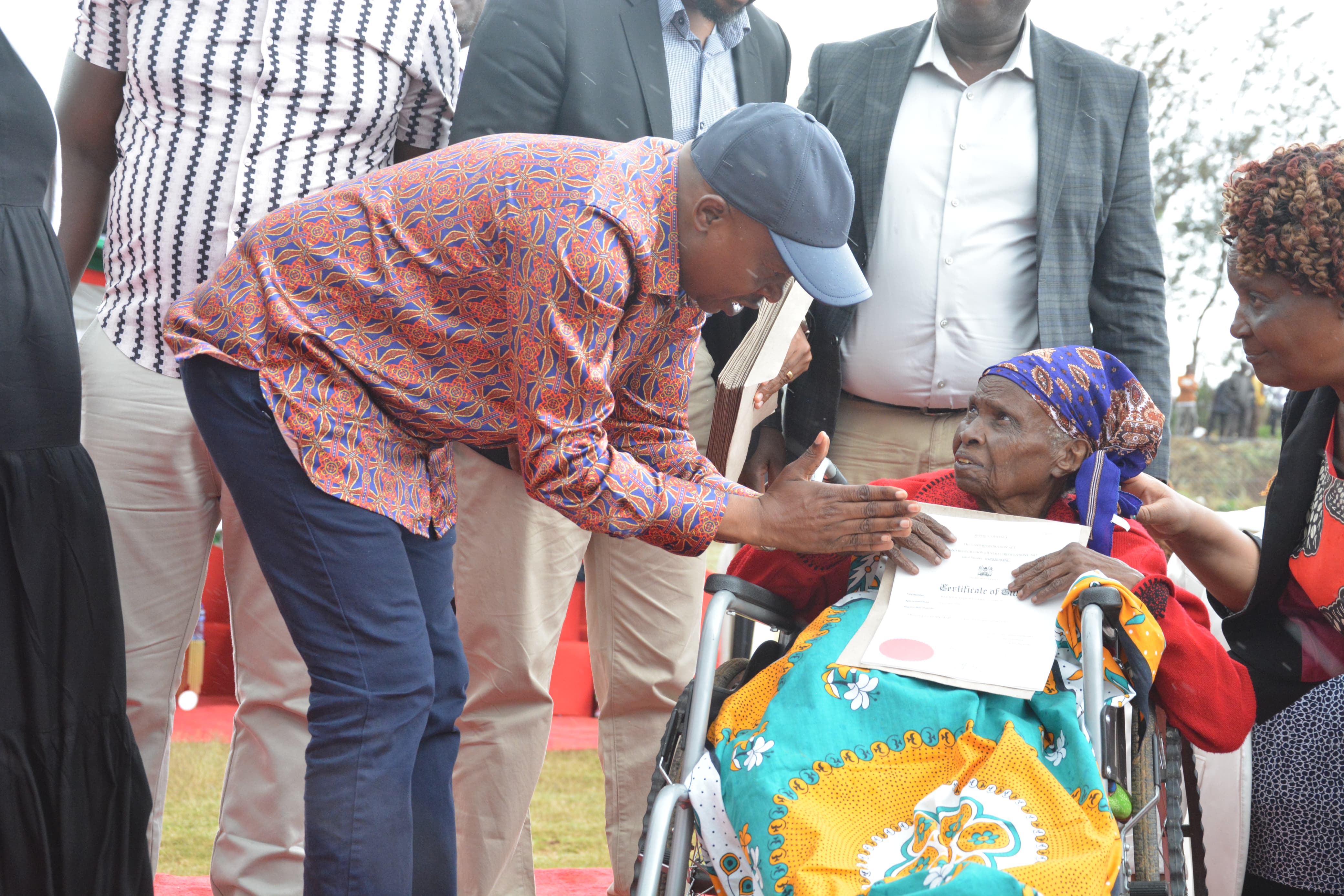 Deputy President Prof Kithure Kindiki issues a title deed to one of the land owners affected by the deadly April 29, 2024 flood incident that hit Mai Mahiu villages. He said the government plans to resettle all the 161 victims including tenants whose houses were equally destroyed. 