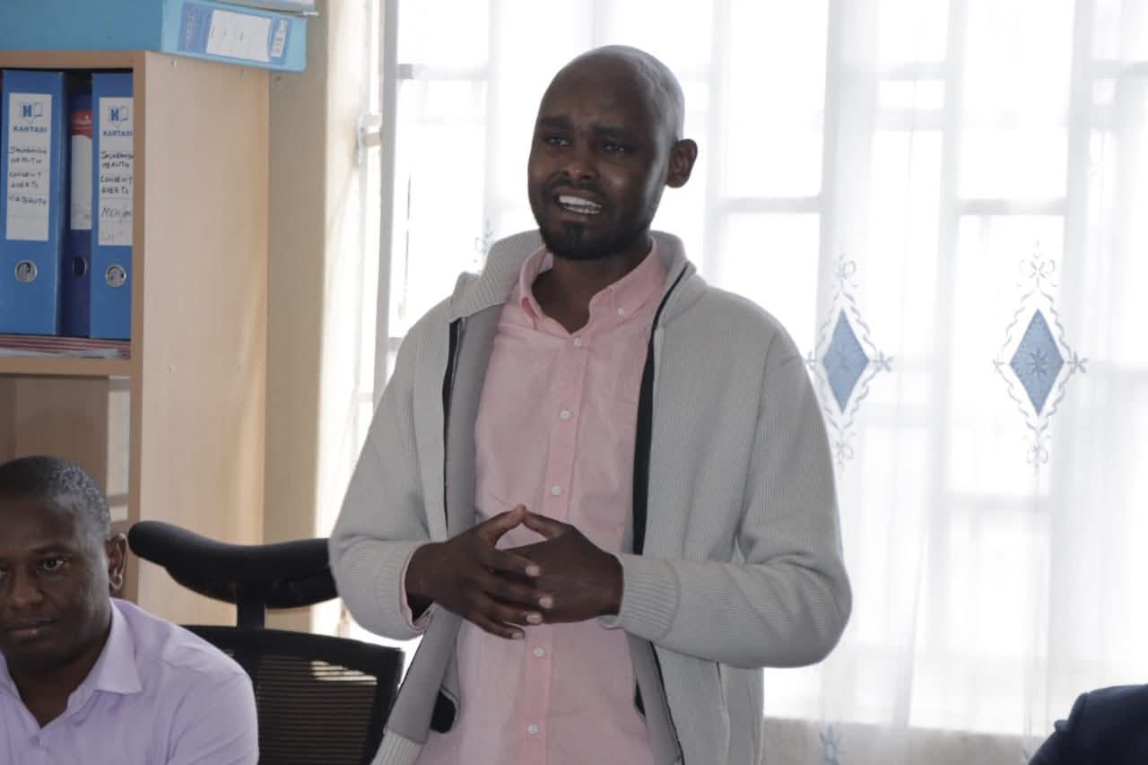 Narok County Executive Committee Member (CECM) in charge of Health Antony Namunkuk speaks during the donation of the AI enabled digital X-ray machine.