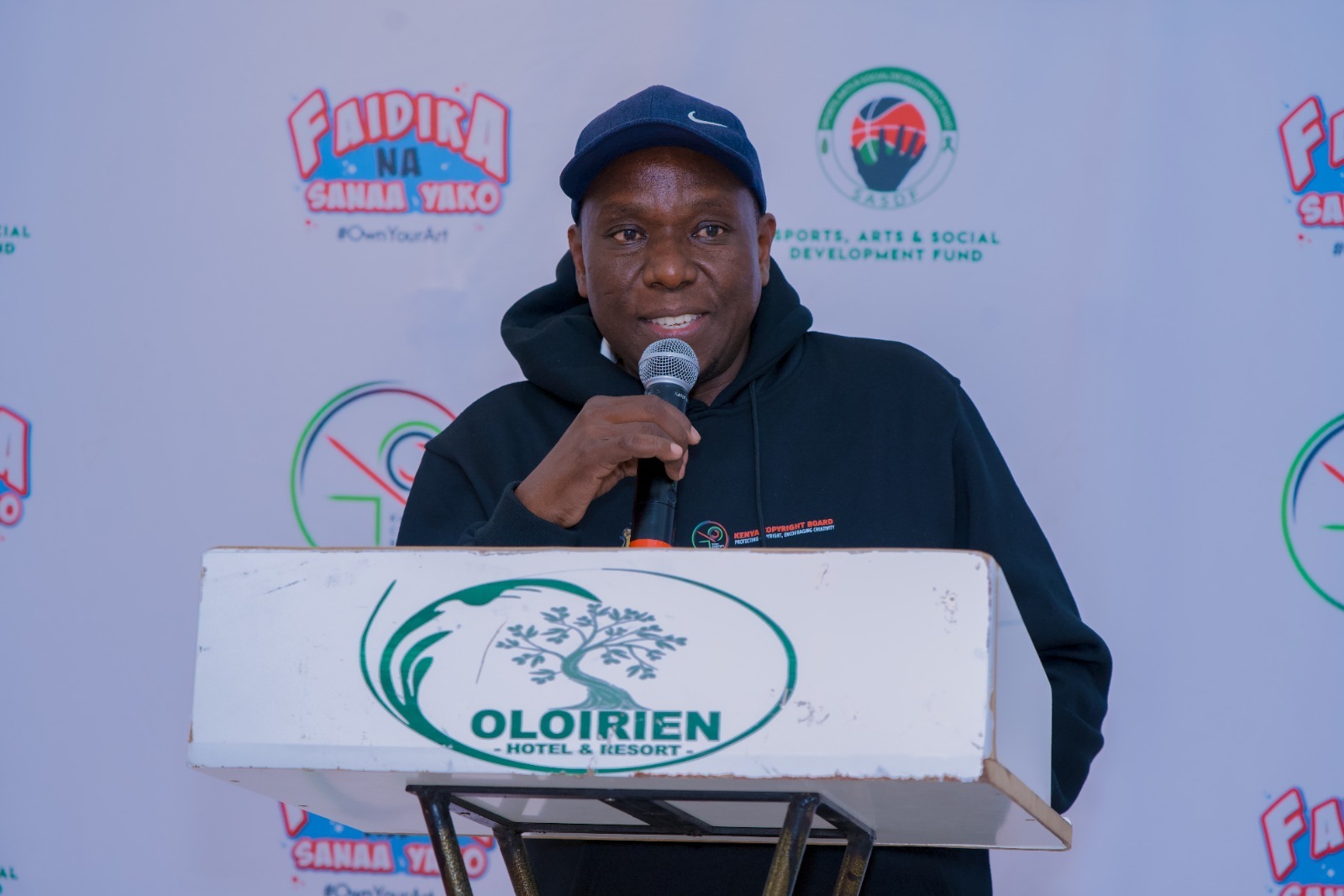 Acting Executive Director,  Kenya Copyright Board  George Nyakweba delivers  his speech in Narok.