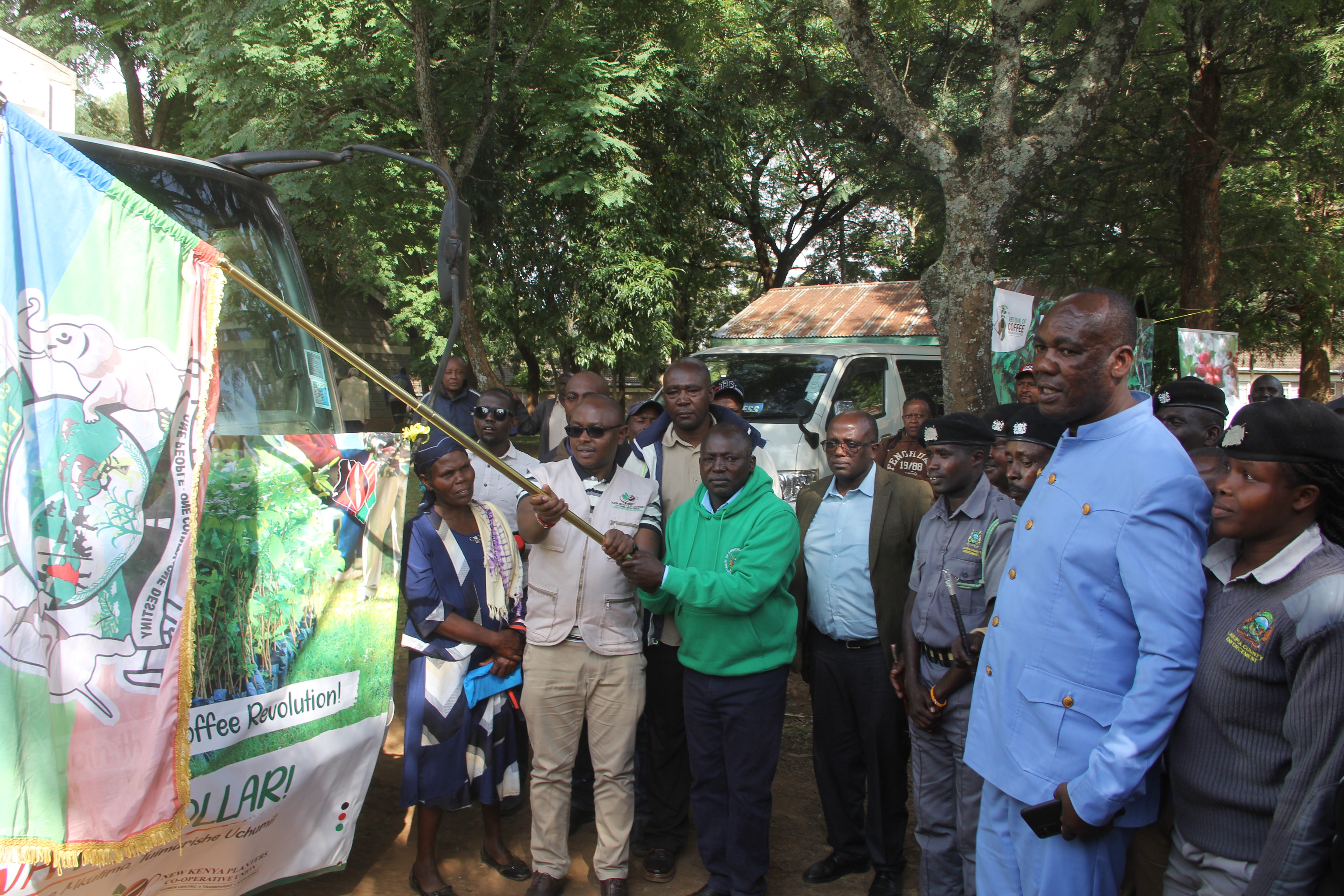  Laikipia County Governor, Joshua Irungu, (with county flag) flags off some 20,000 coffee seedlings in Kinamba.