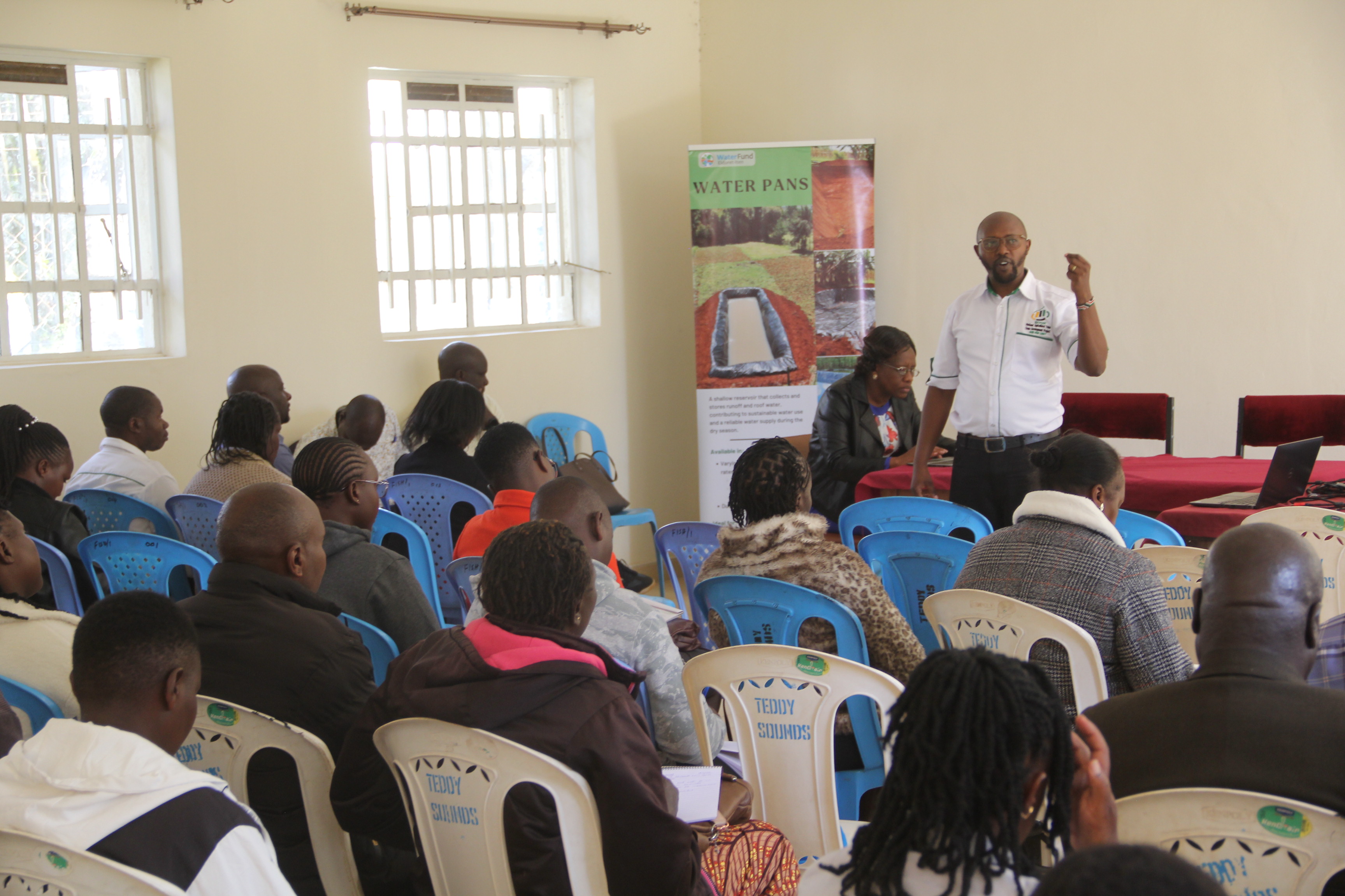 NAVCDP Monitoring and Evaluation In-Charge for Uasin Gishu, Mark Sanka, addresses supervisory teams during training on the Farm Ponds Initiative in Eldoret, Uasin Gishu County.