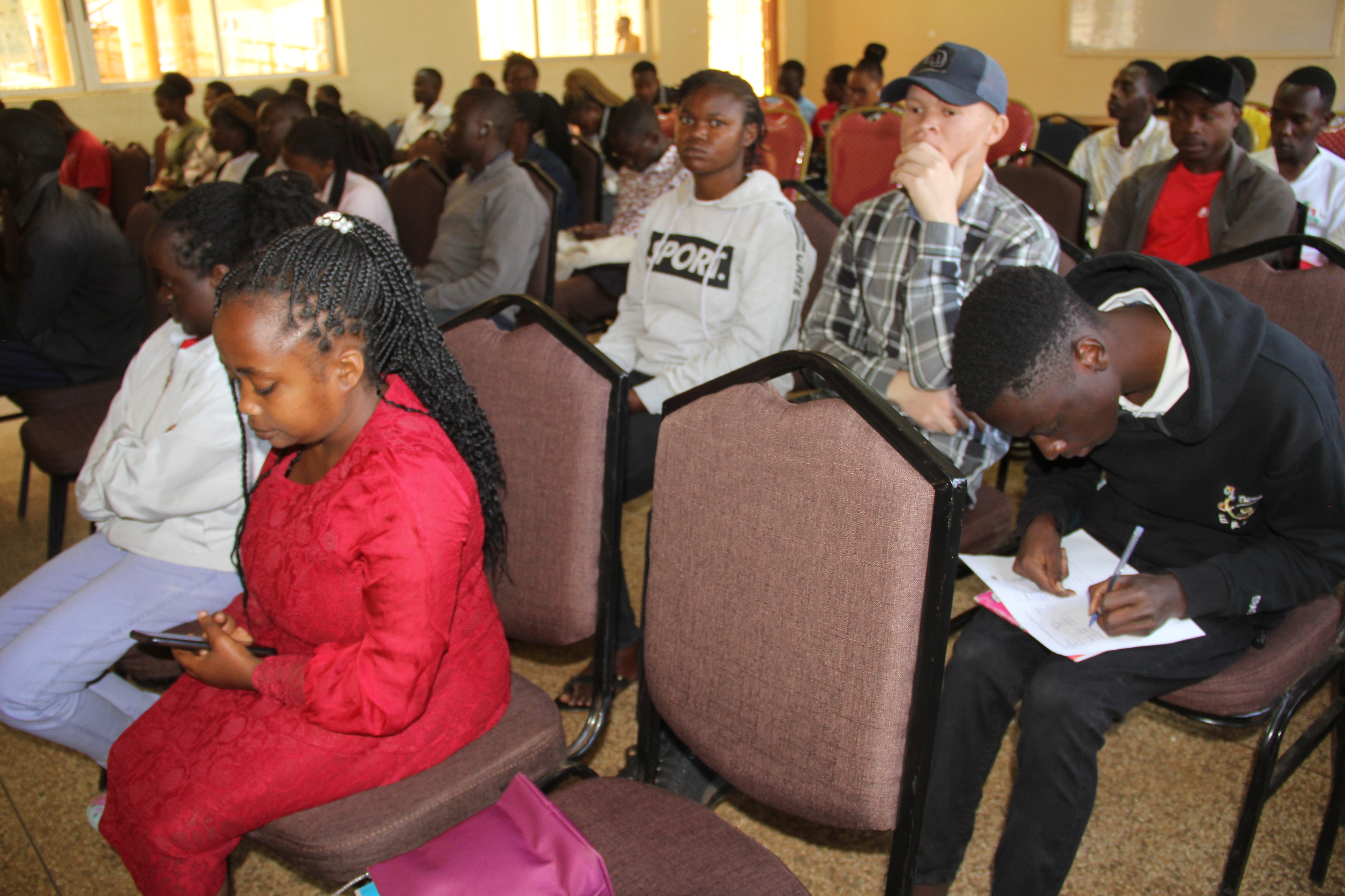 PWD Students receiving training to excel in careers during the launch of Tunza Mentorship and Career Guidance Programme at the Eldoret University, Uasin Gishu county.