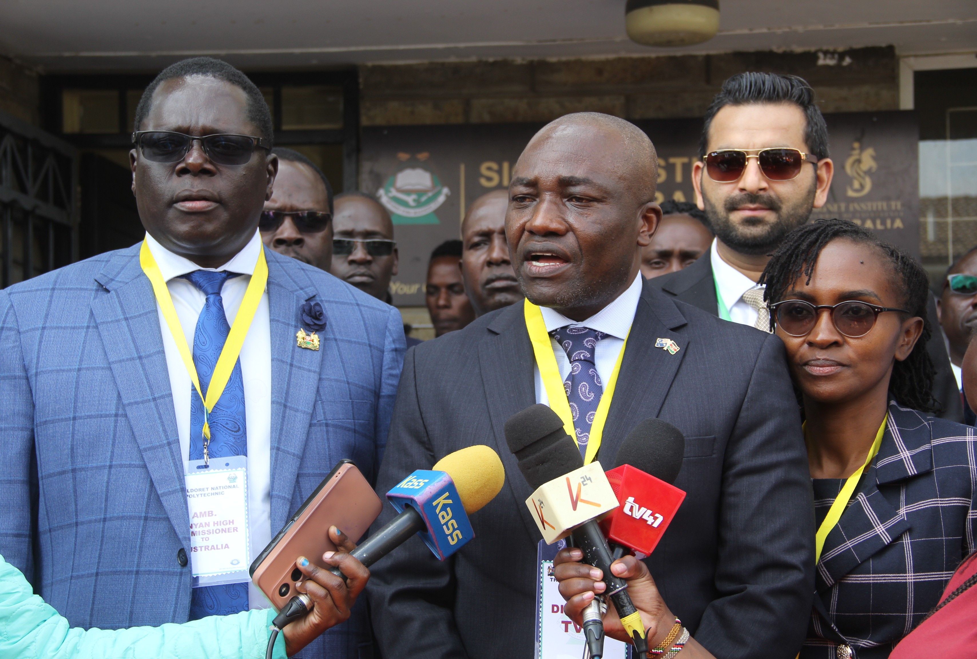 The Kenya High Commissioner to Australia Dr. Wilson Kogo (3rd left), TVET Director John Tuwei (2nd left), Signet Institute Sales and marketing Head Muhammad Ali (right) officially launched the Signet Institute of Australia office in Eldoret National Polytechnic, Eldoret, Uasin Gishu County. PHOTO/ EKUWAM SYLVESTER