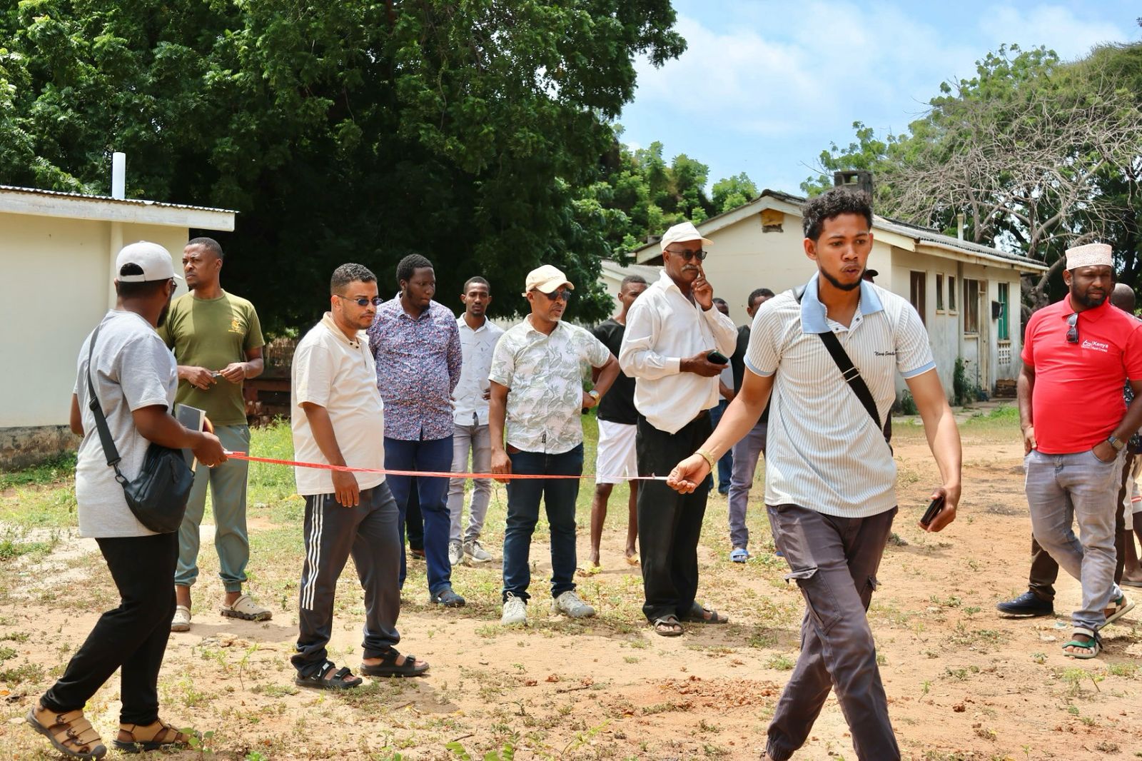  Lamu Deputy Governor Dr. Mbarak Bhajaj tours the recently refurbished Kiunga Health Centre with county medical services officials and Kenya Red Cross Lamu Coordinator Abdul Hakim Abdu (Red Shirt) in a facility that will provide medical services at the border point area. Photo by Amenya Ochieng