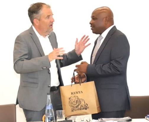 Labour and Skills Development Principal Secretary Shadrack Mwadime (right) flanked by Dr Jürgen Ratzinger, Managing Director for International Business at the Chamber of Commerce and Industry in Germany.