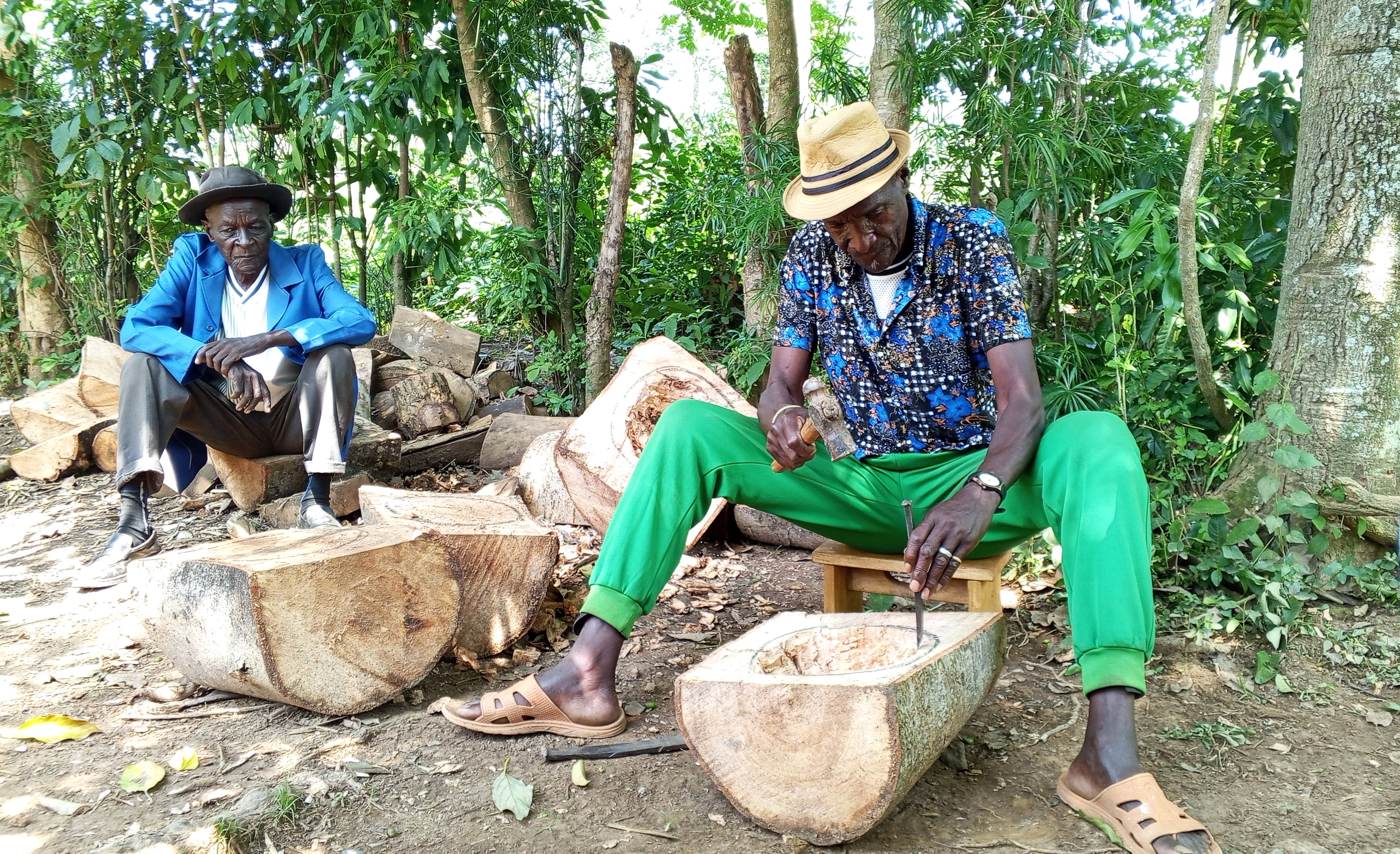  Charles Obong'o Mak'Omenda aka Obong'o Nyundo, at the initial stages of curving Nyatiti music instrument