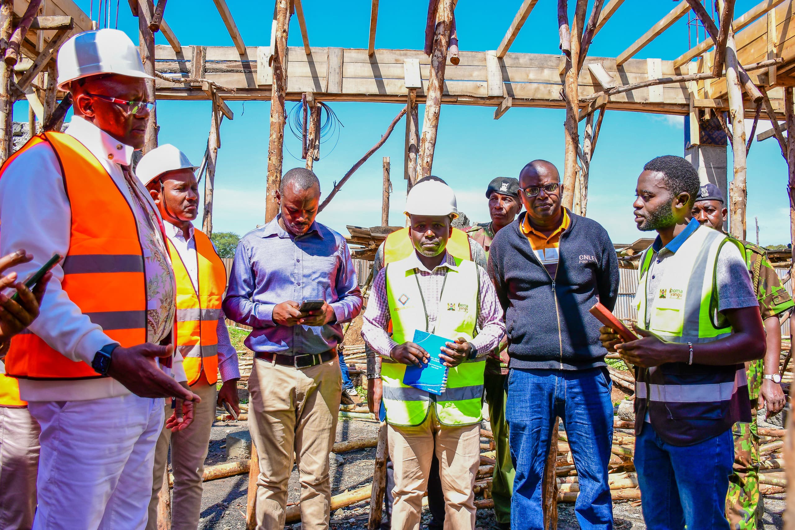 Deputy Chief of Staff in charge of Performance and Delivery Management at the Executive Office of the President, Mr. Eliud Owalo (left) engaging officers from the Special Economic Zone Authority on the Naivasha SEZ master plan