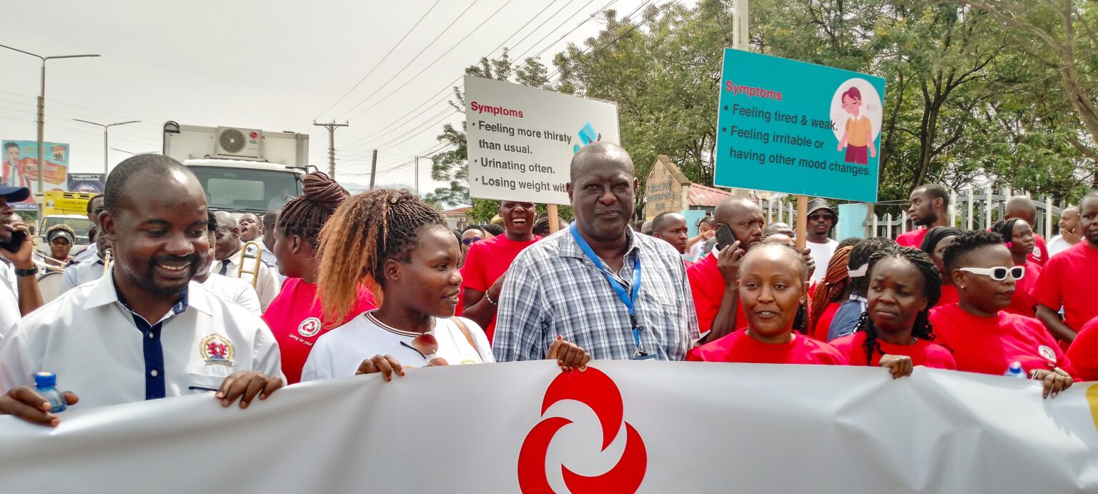 JOOTRH Chief Executive Officer Dr. Richard Lesiyampe joins medics and residents of Kisumu in a procession to mark World Kidney Day. PHOTO: CHRIS MAHANDARA