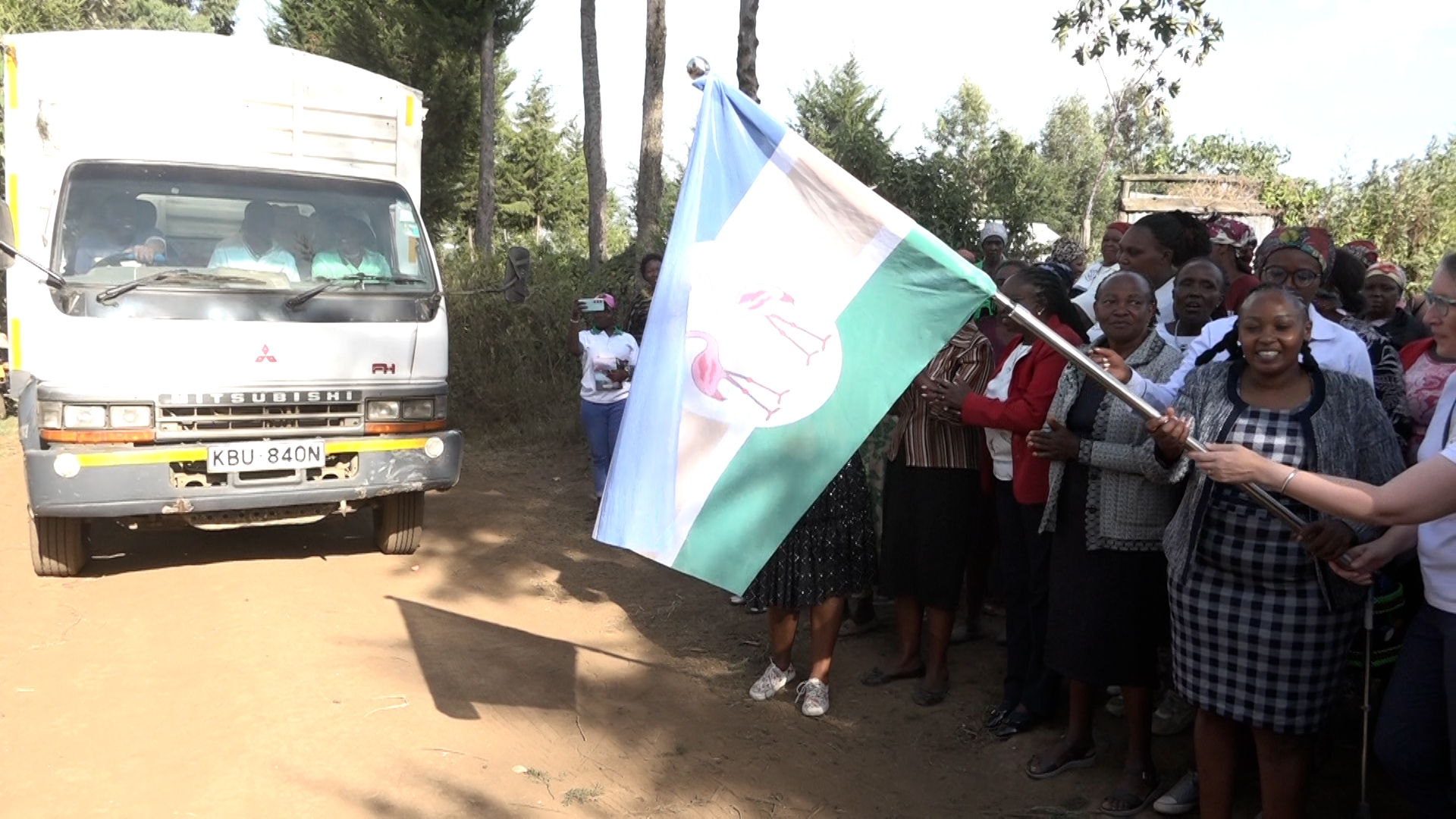 County Chief Officer for Agriculture, Engineer Margaret Kinyanjui, officially flags off nine tonnes of beans produced by the Ushirikiano Women Group at Kiambogo Centre in Gilgil Sub-County.