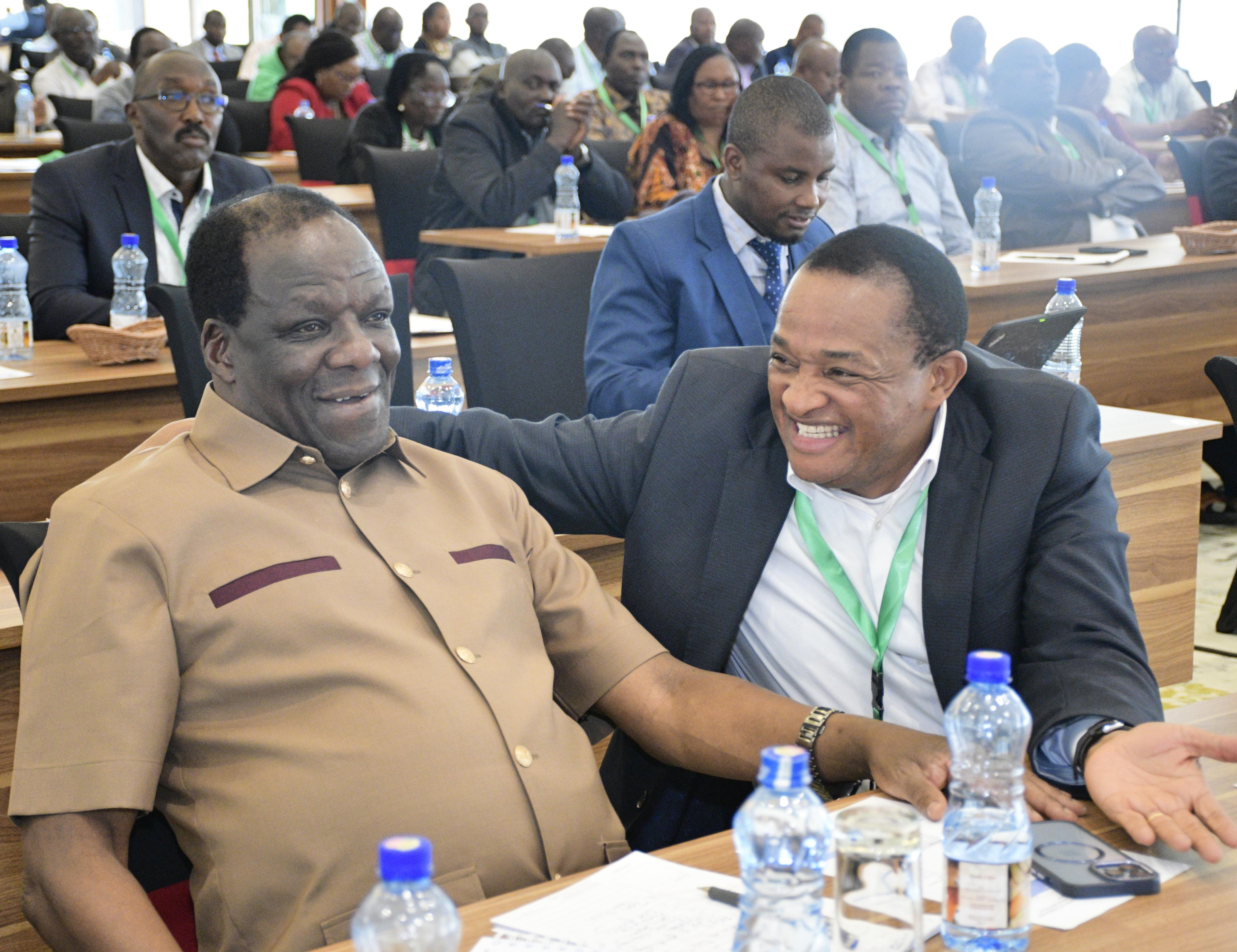 Co-operative Cabinet secretary Wycliffe Oparanya and the Cooperative Alliance of Kenya (CAK) McCloud Malonza  during the cooperative leaders conference.
