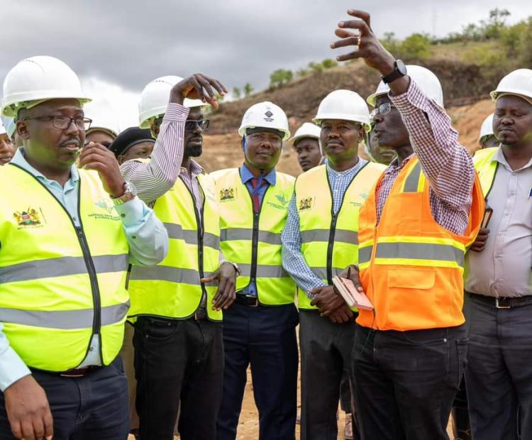 Water and Irrigation Cabinet Secretary Eng Eric Mugaa (second left) and other stake holders during a tour of Umaa Dam in Kitui County.