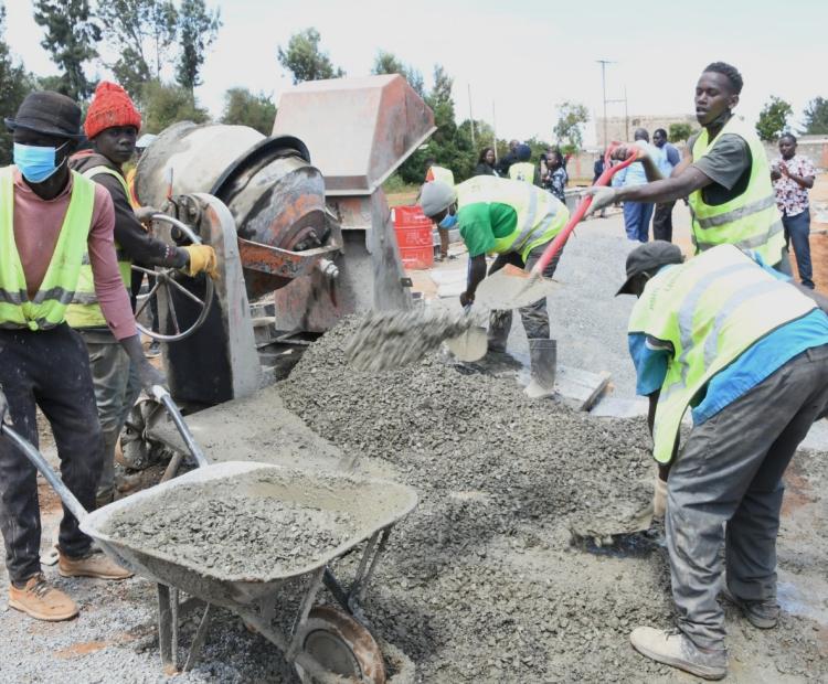 Ongoing improvement of road to bitumen standards in Maili Inne informal settlement.