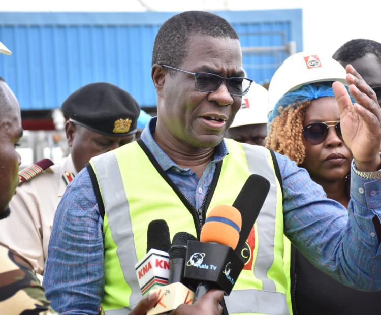Energy Cabinet Secretary (CS) Opiyo Wandayi. addressing the media in Kisumu  The CS during a tour of the Kisumu oil jetty