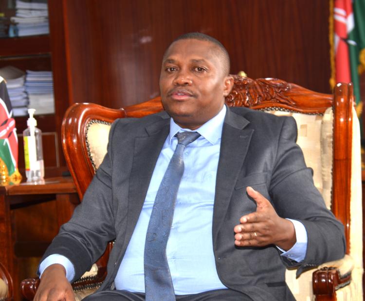 PS Mining Elijah Mwangi makes a point during the meeting with NCTC officials in his Nairobi office