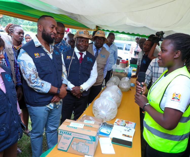 S for Mining, Blue Economy and Maritime Affairs Hassan  Joho with host Governor Fernandes Barasa and other  Government officials inspect fish feeds to be distributed  to farmers under the Aquaculture Business Development  Programme in Kakamega. Photo/ Moses Wekesa.