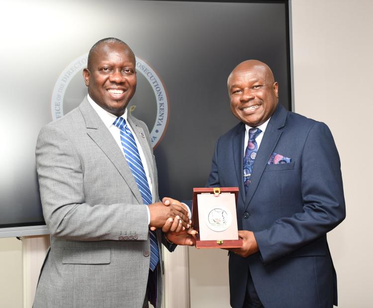 Labour Principal Secretary Shadrack Mwadime and  Director of Public Prosecutions (DPP) Renson Igonga  during a meeting to discuss how to enforce labour laws.  Photo/Catherine Kamau