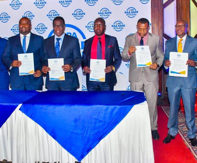 Cabinet Secretary (CS) Energy and Petroleum, Opiyo Wandayi (Fourth Left) with other stakeholders after the launch of ‘Kaa Safe Mtaani’ that advocates for safety standards in the energy and petroleum sector in Nairobi.
