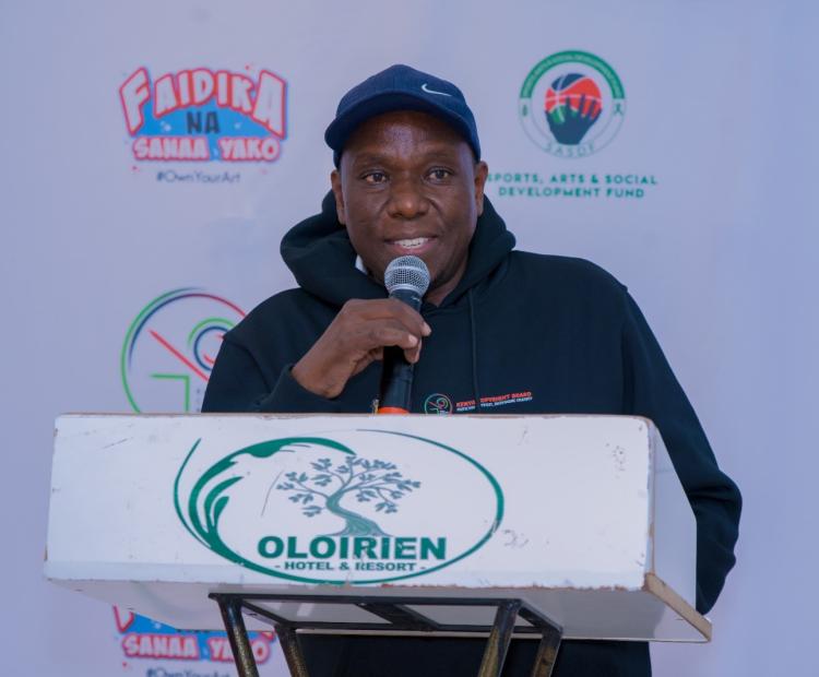 Acting Executive Director,  Kenya Copyright Board  George Nyakweba delivers  his speech in Narok.