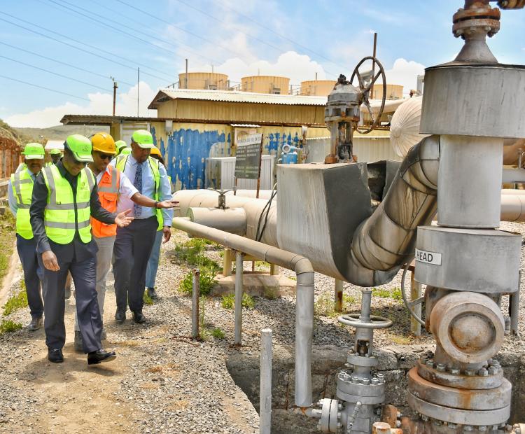 Energy and Petroleum Cabinet Secretary Opiyo Wandayi  (left) inspects a geothermal facility during his official  familiarization tour of geothermal- rich Olkaria area in  Naivasha weeks ago. PHOTO/ ERASTUS GICHOHI