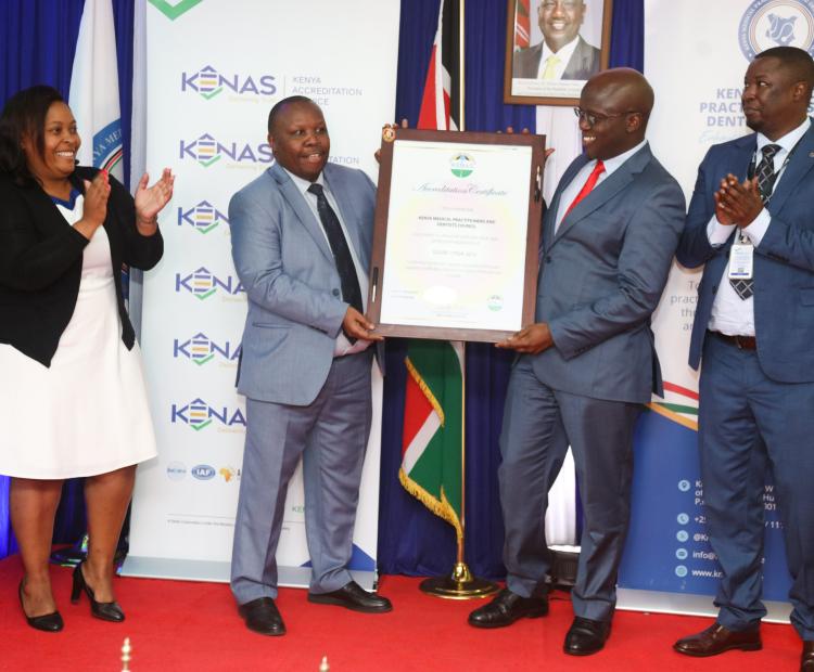KMPDC CEO Dr. David Kariuki (Second left) during a past event at the council offices