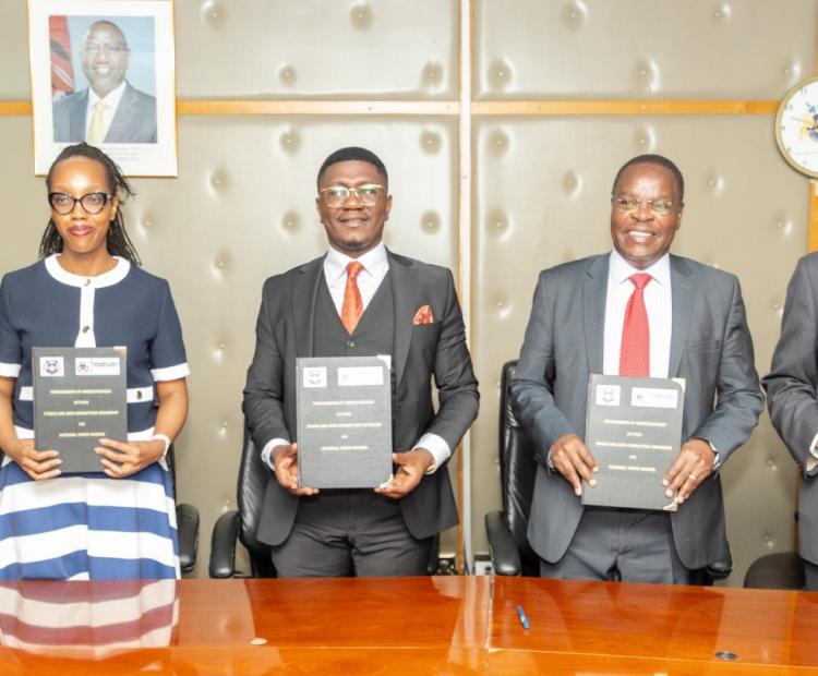 The National Youth Council Acting CEO Ms Gloria Wawira, KEPSA Youth Sector Chairperson Ms Carolyne Warui,  Youth Affairs and Creative Economy PS Mr.. Fikirini Jacobs the EACC Chairman Dr. David Oginde  and EACC Secretary/CEO Abdi Mohamud display the MOU signed between the EACC and the National Youth Council.