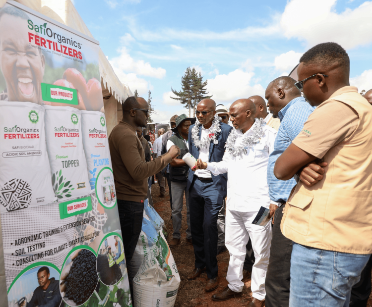  State Department for Agriculture and Livestock Principal Secretary  Dr Paul Ronoh (third right) and Nakuru Deputy Governor Dr David  Kones (Fourth left) during a meeting with potato farmers. He  affirmed that the Government is committed to implementing the  Irish Potato Regulations 2019 that compels traders to package  the crop in 50-kilogram bags