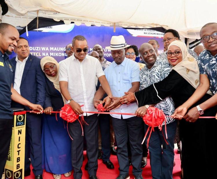  Information, Communications and the Digital Economy Cabinet Secretary (CS) William Kabogo (centre) launches Terrestrial Fiber Link connecting Kenya and Tanzania at Lunga lunga/Horohoro border