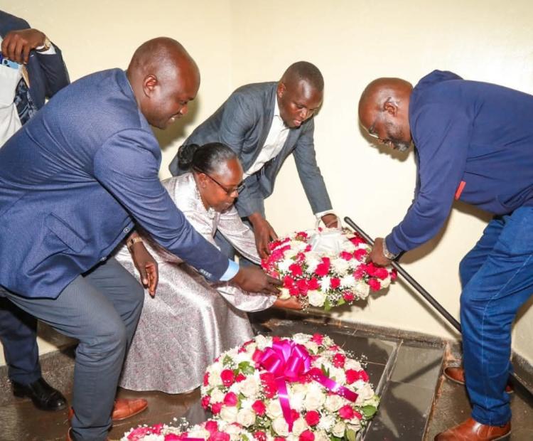 Nandi Deputy Governor Dr. Yulita Mitei (center) flanked by other leaders laying a wreath of flowers at the Koitalel Samoei Mausoleum in Nandi Hills.