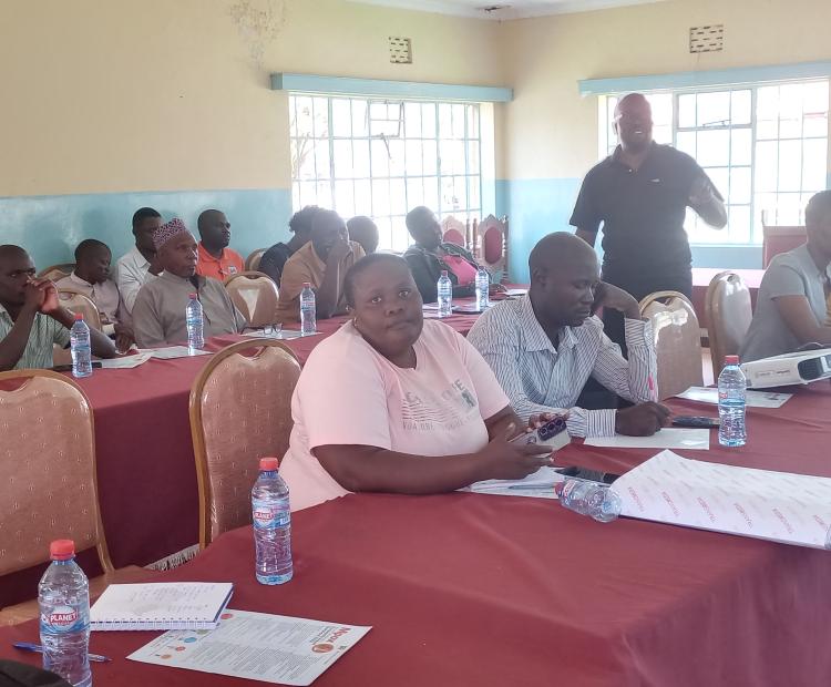 Busia Sub County Health Promotion Officer Kennedy Oloo address stakeholders during the Mpox Sensitization exercise at the County Commissioner’s Conference Hall 