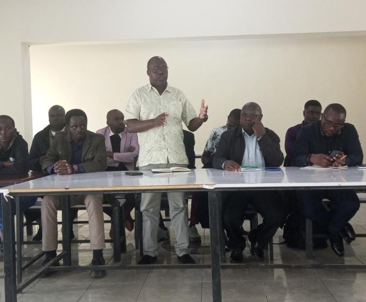 Enock Kipseba,Secretary for Geological Survey in the State Department for Mining under the Ministry of Mining,Blue Economy and Maritime Affairs, making his address at Sangak primary school in Pokot Central sub county,where he introduced the geological survey team to the public Photo By Anthony Melly