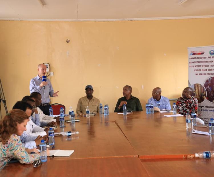 Mr Ben Fisher, Head of the UK’s Integrated Security Fund and Senior Regional Conflict Adviser at the British High Commission Nairobi, speaking during the close-out meeting of the Deris Wanaag programme in Wajir County, marking the unveiling of the Geriley Community Borehole.