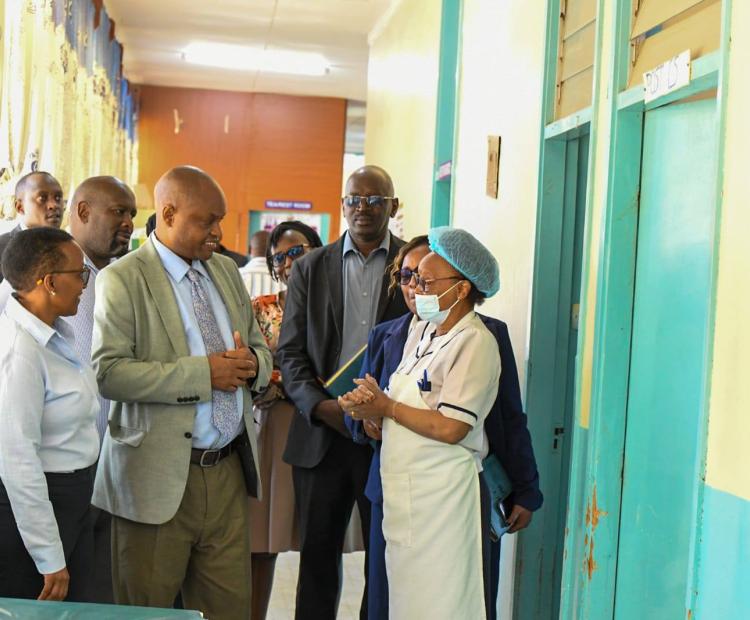 Health advisor in the office of the President Dr Wilson Aruasa (2nd L) speaking at Gilgil  Sub County Hospital. Photo by Esther Mwangi